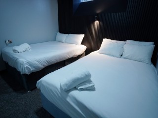 Mason Street Basement Apartment 1 - Nero Suite | Sleeps 14 thumbnail