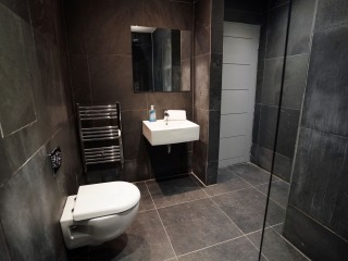 Mason Street Basement Apartment 1 - Nero Suite | Sleeps 14 thumbnail