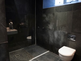 Mason Street Basement Apartment 1 - Nero Suite | Sleeps 14 thumbnail