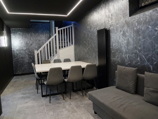 Mason Street Basement Apartment 1 - Nero Suite | Sleeps 14 image