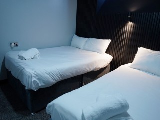 Mason Street Basement Apartment 1 - Nero Suite | Sleeps 14 thumbnail