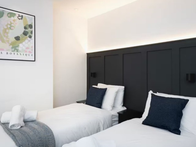 Modern Townhouse With Hot Tub | Sleeps 13 image