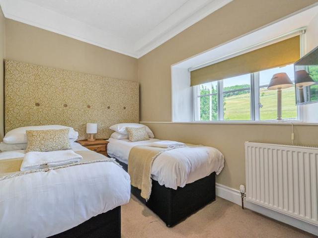 Windermere 14 Sleeper house | Hot Tub and Cinema room image