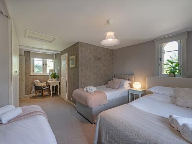 Bath | 24 Sleeper House with Hot Tubs image