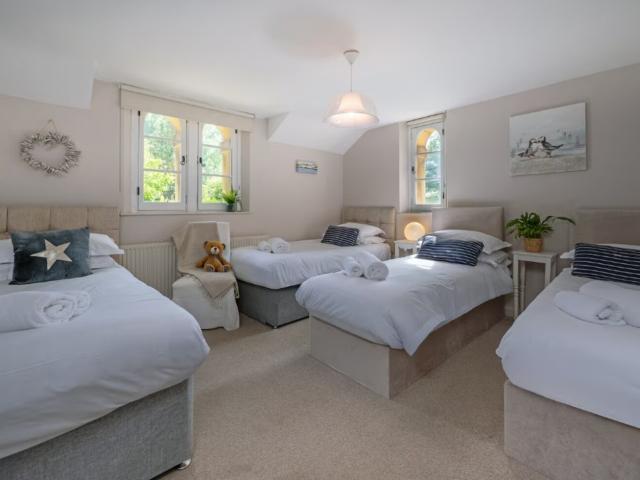 Bath | 24 Sleeper House with Hot Tubs image