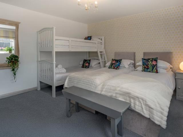 Bath | 24 Sleeper House with Hot Tubs image