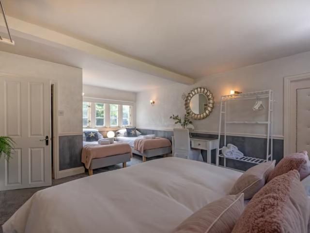 Bath | 24 Sleeper House with Hot Tubs image