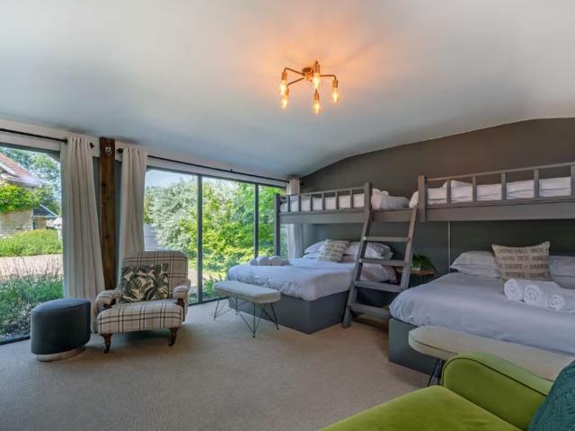 Bath | 24 Sleeper House with Hot Tubs image