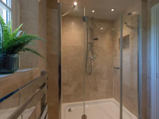 Bath | 24 Sleeper House with Hot Tubs image