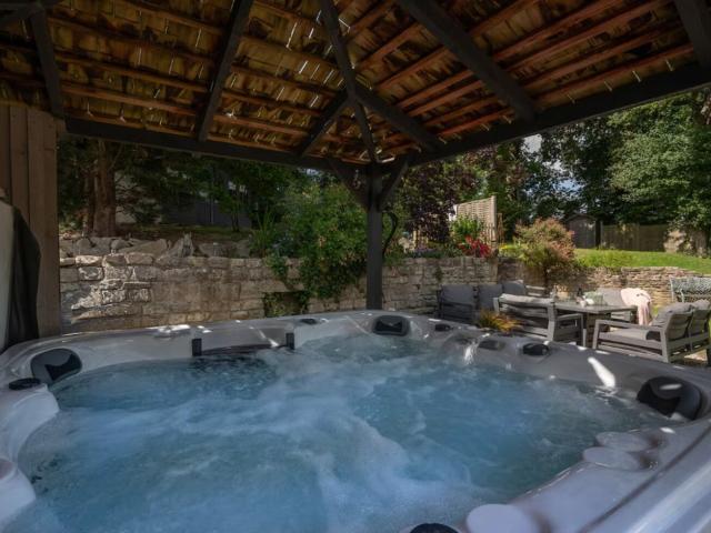 Bath | 24 Sleeper House with Hot Tubs image
