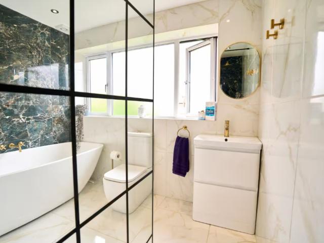 Prestwich House | Sleeps 12 with Hot Tub image
