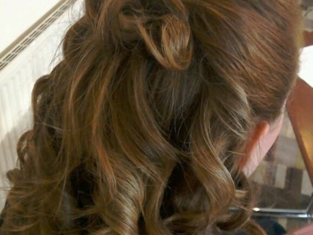 Hairstyling and Makeup image